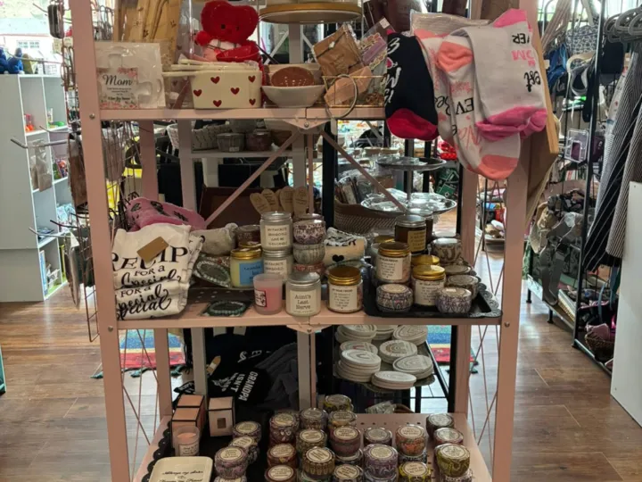 Shelves of candles, mugs, socks and gifts inside The Thimble of West Texas.