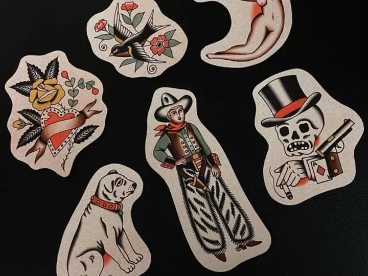 Hand-painted tattoo flash cutouts, including a rose, a cowboy, a dog and a skeleton in a top hat.